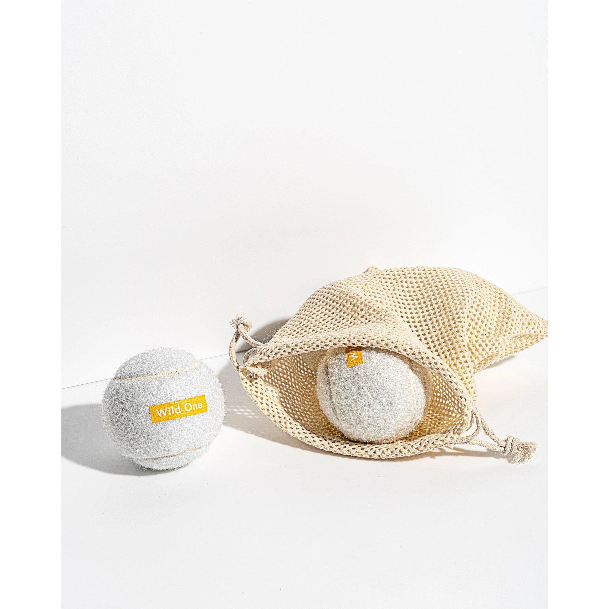 Set of 4 Tennis Balls in White by Wild One - Haven